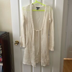 Long crocheted cardigan with tie at waist. New York & Co. Nice* condition. XS